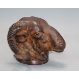 A bronze ram's head depth 14cm