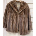 A beige mink jacket