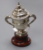 A small George V silver two handled presentation cup and cover, Alexander Clark Co. Birmingam,