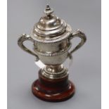 A small George V silver two handled presentation cup and cover, Alexander Clark Co. Birmingam,