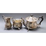 A George V silver three piece silver tea set by Robert Pringle & Sons, London, 1921, and a pair of