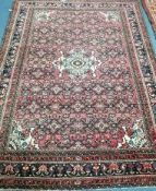 A Hamadan red ground rug 200 x 150cm