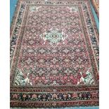 A Hamadan red ground rug 200 x 150cm