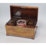 A George IV brass inlaid rosewood tea caddy and associated sugar bowl length 31cm