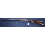 A Tate & Tate 12-bore side by side shot gun, (Gunmakers of Eastbourne) Purchaser must supply their