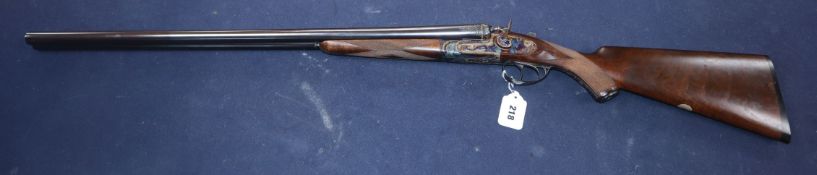 A Tate & Tate 12-bore side by side shot gun, (Gunmakers of Eastbourne) Purchaser must supply their