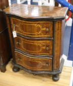 An 18th century Italian inlaid walnut three drawer serpentine front commode W.68cm