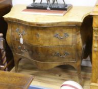 A Continental walnut bombe commode W.120cm