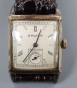 A gentleman's 1930's? 10k gold filled Gruen Precision manual wind wrist watch, with rectangular