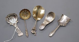 A George IV silver caddy spoons, John Bettridge, Birmingham, 1821, three other silver caddy spoons