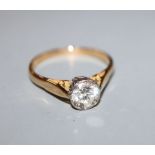 A modern 18ct gold and solitaire diamond ring, the stone weighing approximately 0.80cts, size Q.