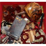 A box of sundry jewellery etc. including a simulated cherry amber necklace.