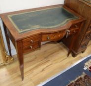 An Edwardian inlaid rosewood bow front writing table W.90cm