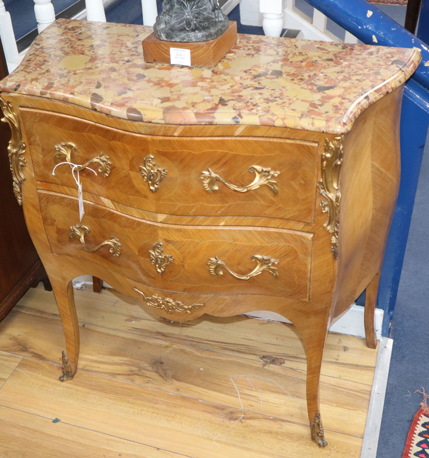 A Louis XVI style marble top serpentine commode W.82cm