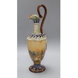 A Doulton Lambeth pottery ewer by Hannah Barlow, decorated with a dog chasing ducks height 36cm