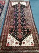 A Turkish hall carpet 275 x 130cm