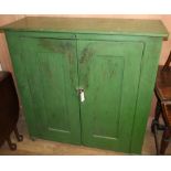 A Victorian painted pine two door cabinet W.110cm