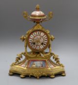 A 19th century French ormolu and porcelain mounted mantel clock