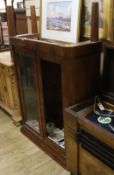 A Biedermeier style glazed two door cabinet W.96cm