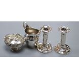 A George III silver helmet cream jug, a 1920's imported German silver bowl and a pair of silver