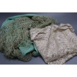 'One lace shawl and a green silk shawl'