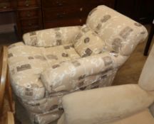 An early 20th century featherdown upholstered armchair