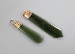 Two Edwardian 9ct mounted nephrite pendants, largest 53mm.