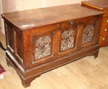 An 18th century oak panelled coffer W.126cm