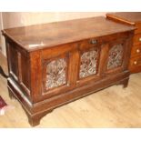 An 18th century oak panelled coffer W.126cm