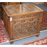 A small 17th century style carved oak coffer W.84cm