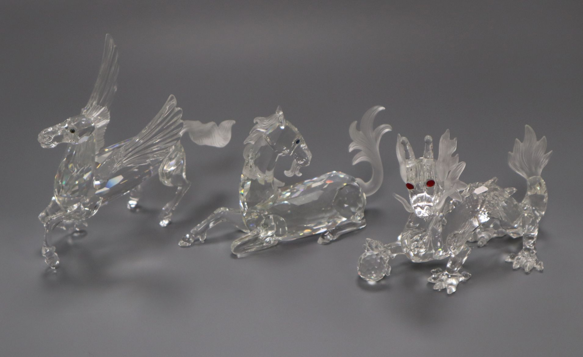 Three Swarovski Annual Edition 'Fabulous Beasts', The Unicorn, The Dragon and The Pegasus, 1996-