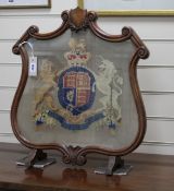 A Victorian mahogany polescreen banner, worked with The Royal Coat of Arms W.52cm