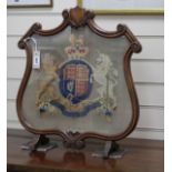 A Victorian mahogany polescreen banner, worked with The Royal Coat of Arms W.52cm