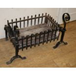 A cast iron fire grate and dogs Grate W58cm