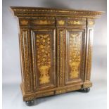 A 19th century Dutch walnut and marquetry armoire, with moulded pediment and two panelled doors