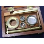 A Victorian mahogany cased brass pocket microscope