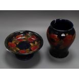 A Moorcroft Pomegranate pattern baluster vase and a similar tazza, each with painted facsimile