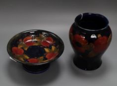 A Moorcroft Pomegranate pattern baluster vase and a similar tazza, each with painted facsimile
