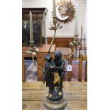 A spelter figural three branch candelabra height 71cm