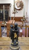 A spelter figural three branch candelabra height 71cm