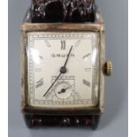 A gentleman's 1930's? 10k gold filled Gruen Precision manual wind wrist watch, with rectangular
