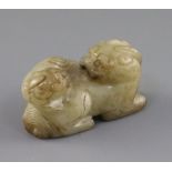 A Chinese pale celadon and brown jade group of a lion dog and cub, 18th / 19th century, L.6.3cm