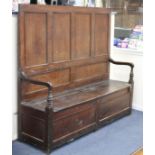 A late 18th / early 19th century oak panelled back box-seat settle W.170cm