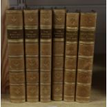 Four leather-bound volumes of 'The English Rogue' and two volumes of 'Ali Baba'