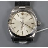 A gentleman's 1960's stainless steel Rolex Oyster precision manual wind wrist watch, on a