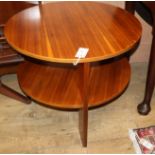 A 1940's modernist coffee table, with a utility furniture stamp to the underside. Diameter 61cm