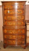 A reproduction serpentine walnut tallboy W.76cm