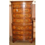 A reproduction serpentine walnut tallboy W.76cm