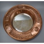 An Arts and Crafts port hole mirror, in the John Pearson Style diameter 45cm