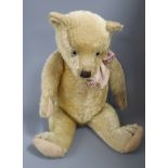 An English Chiltern type bear, 27in., good condition, original pads, glass eyes
